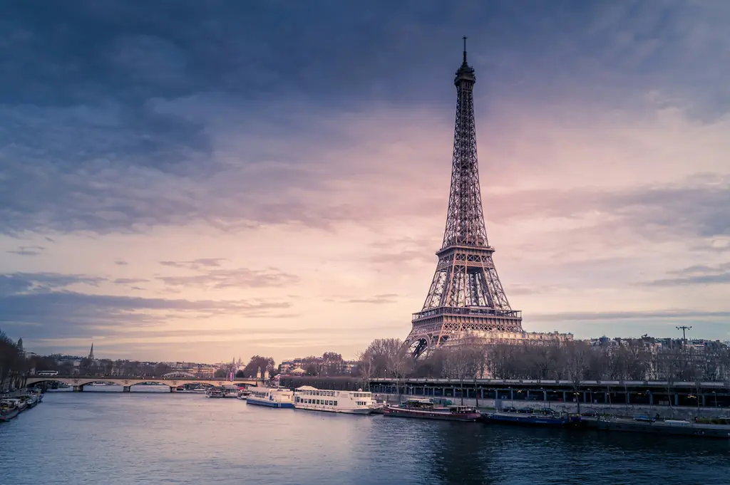 Eiffel Tower and the river Seine in Paris at dusk