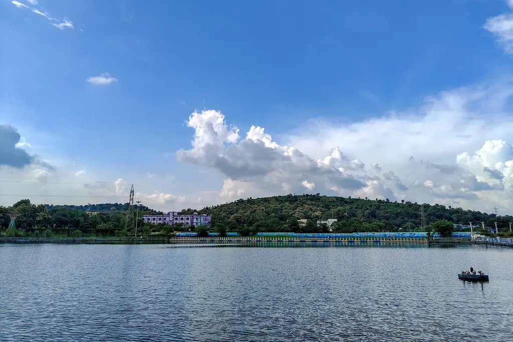 Basanti Sarovar lake in Rourkela under a blue sky