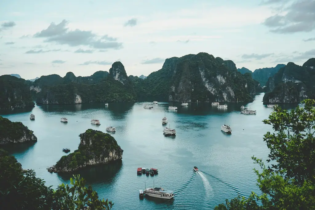 Limestone islands and boats in Ha Long Bay, Vietnam